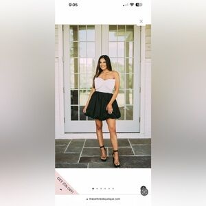 Black and white bow accented dress